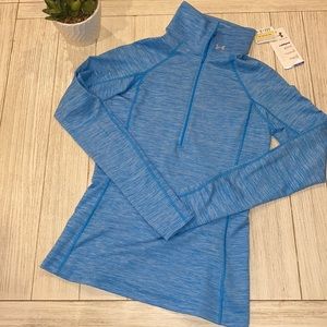 Woman’s Under Armour blue 1/4 cold gear fitted workout shirt size small